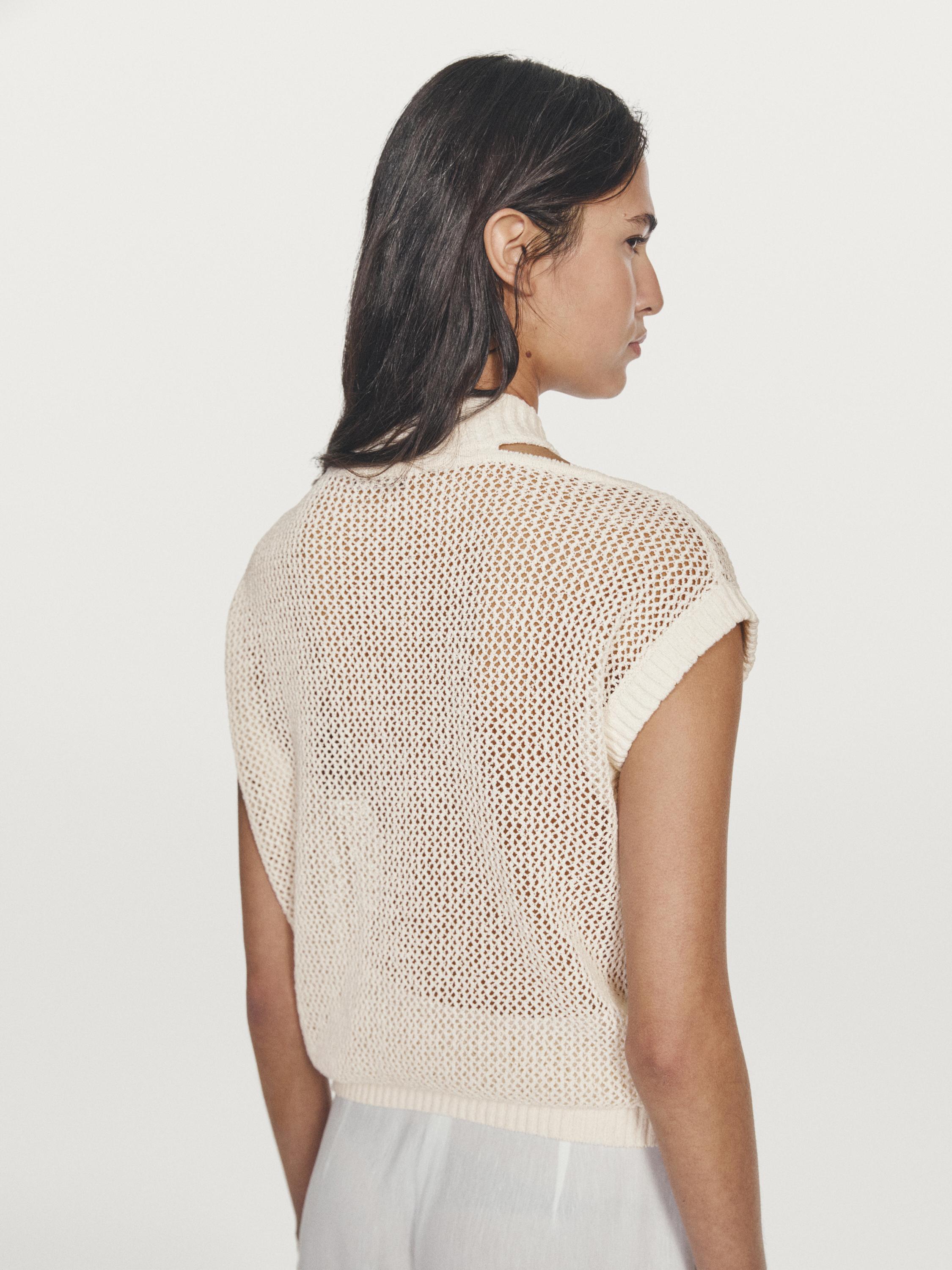 Knit top with cut-out neck